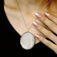Load image into Gallery viewer, ITI NYC Plain Oval Locket in Sterling Silver with Optional Engraving (23 x 14 mm - 57 x 39 mm)