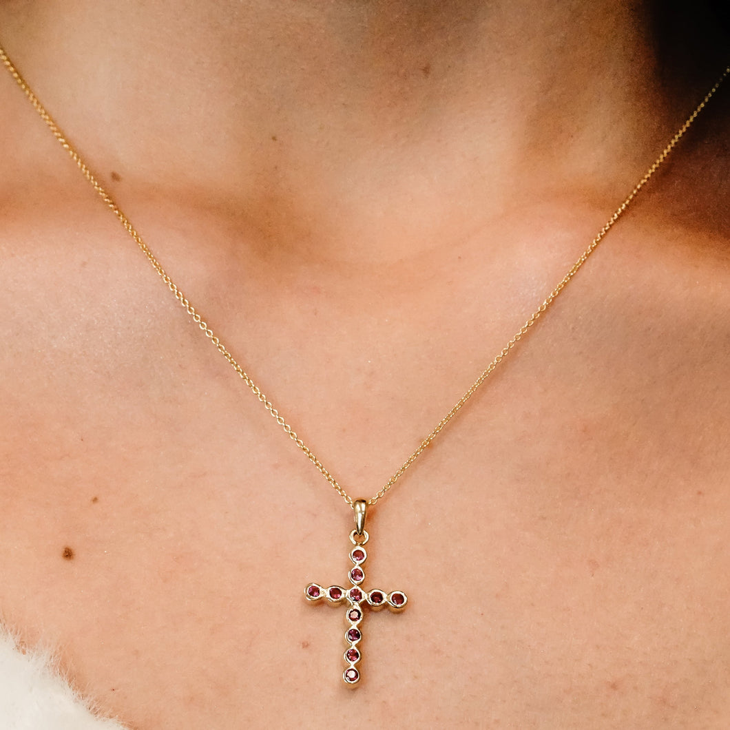 ITI NYC Bezel Set Cross Pendant with Ruby Stones in 14K Gold